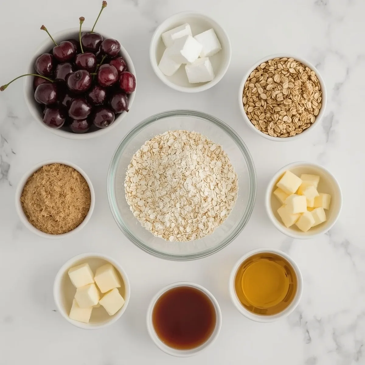 Ingredients arranged for cherry breakfast bars including oats cherries and flour
